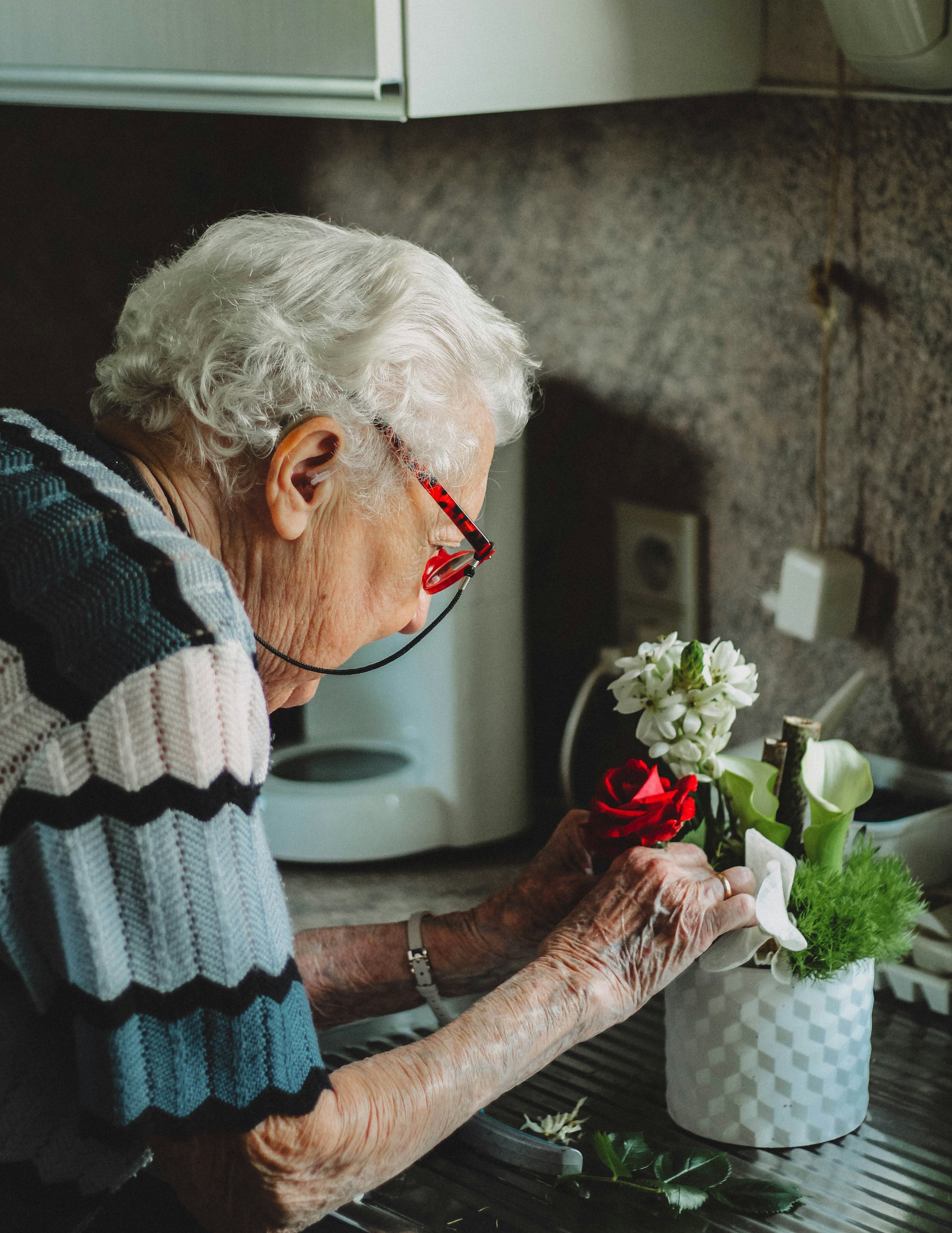 Elderly person at home with family